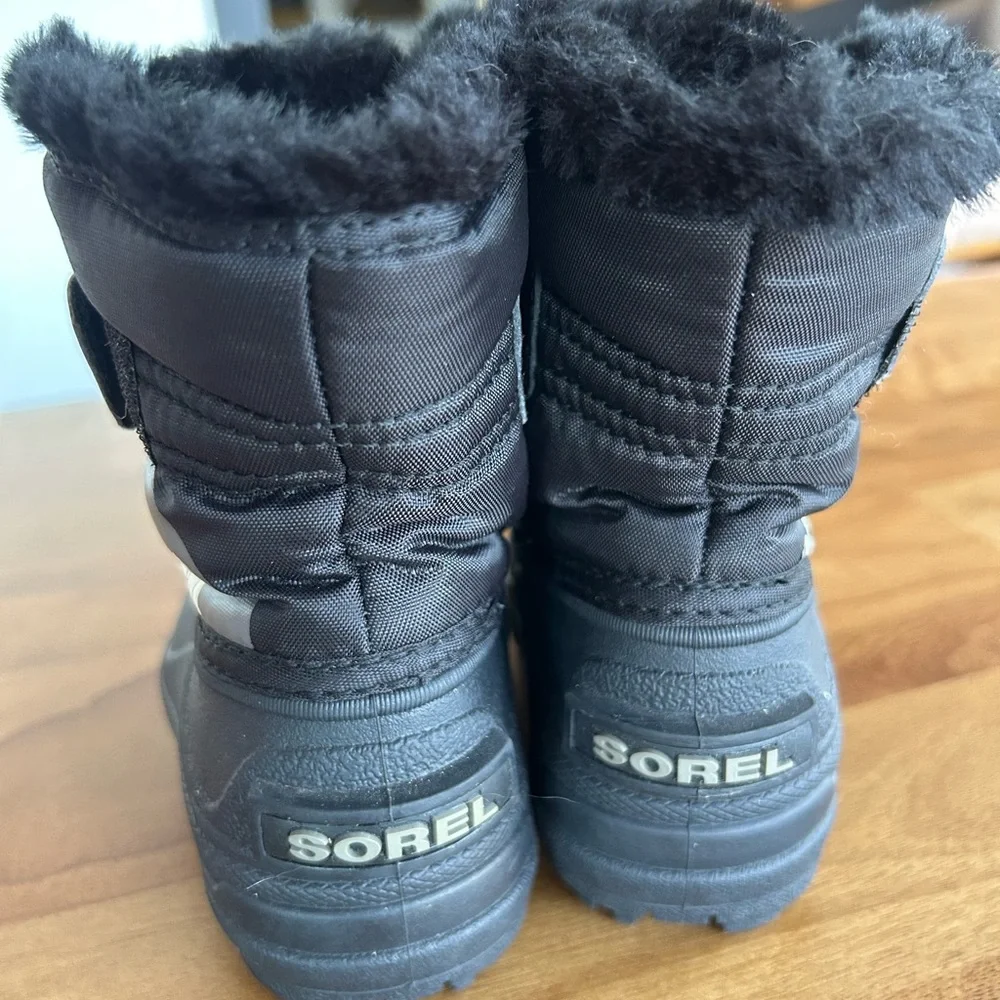 Sorel Kids Black Snow Boots with Velcro strap and Polar Bear Accent. Waterproof.